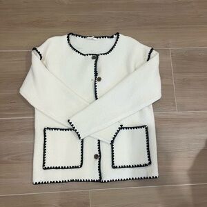 White Sweater with Black Trim